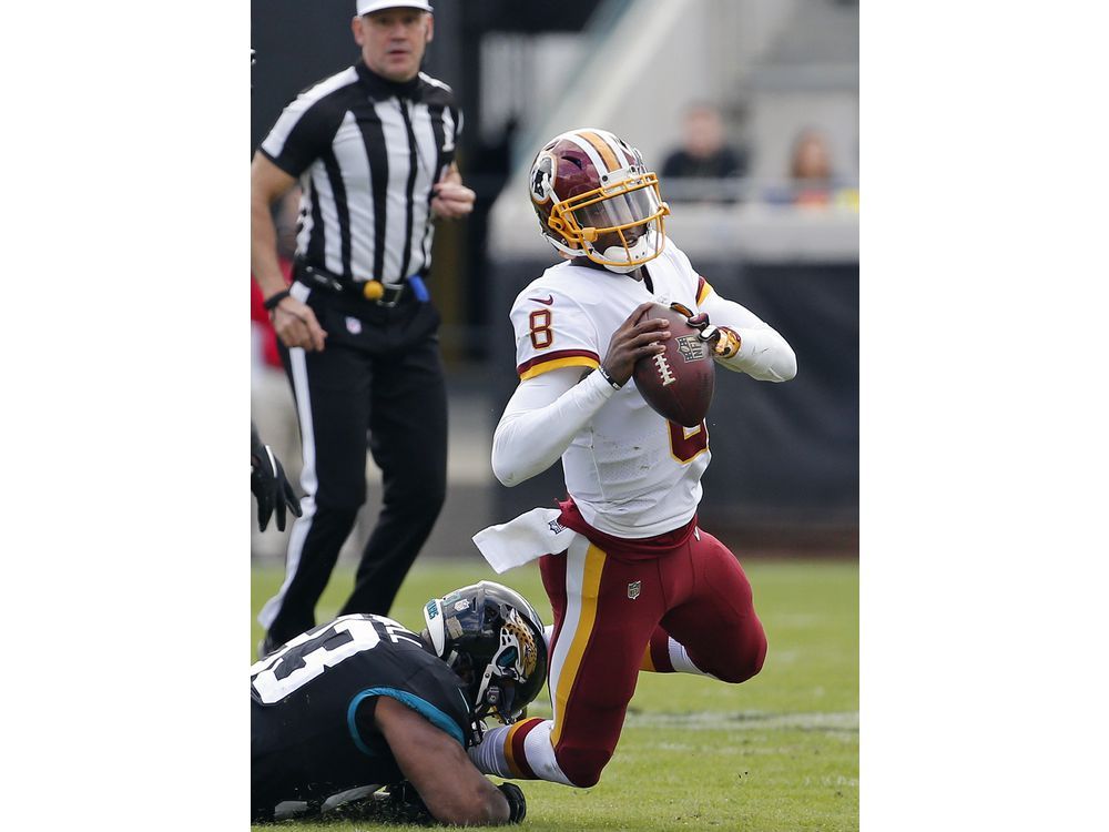 Johnson leads Redskins to late scores, 16-13 win at Jaguars