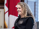 Governor General Julie Payette stands next to a shelf featuring memorabilia from her career as an astronaut, in her office at Rideau Hall in Ottawa on Dec. 11, 2018.