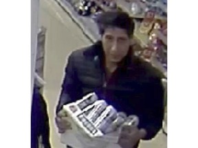 FILE - This undated file photo released Wednesday Oct. 24, 2018, by Britain's Blackpool Police, shows an alleged thief bearing a striking resemblance to actor David Schwimmer, who played the character Ross Geller on the TV show "Friends." A British judge has issued an arrest warrant for an alleged shoplifter whose striking resemblance to David Schwimmer made international headlines, after he failed to show up for a court appearance. Abdulah Husseni failed to appear in court in Blackpool, northwest England, on Tuesday Dec. 18, 2018, to face charges of theft and fraud. (Blackpool Police via AP, File)