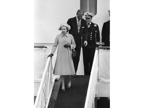 FILE - In this file photo dated Thursday, May 25, 1978, Britain's Queen Elizabeth II and Prince Philip leave the Royal Yacht Britannia for a stopover in Bremerhaven, on her state visit to West Germany. A newly discovered note dated 1995 in the U.K.'s National Archives Saturday Dec. 29, 2018, shows that Queen Elizabeth II let government officials know she would welcome a replacement for the Royal Yacht Britannia once it was decommissioned. The Royal Yacht Britannia was in service from 1954 to 1997.