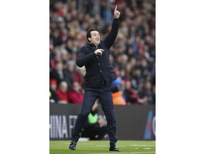 Arsenal manager Unai Emery gestures on the touchline during the game against Southampton during the English Premier League soccer match at St Mary's Stadium in Southampton, England, Sunday Dec. 16, 2018.