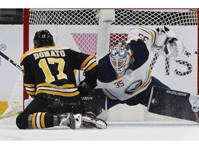 Buffalo Sabres' Linus Ullmark (35) blocks the penalty shot by Boston Bruins' Ryan Donato (17) during the first period of an NHL hockey game in Boston, Sunday, Dec. 16, 2018.