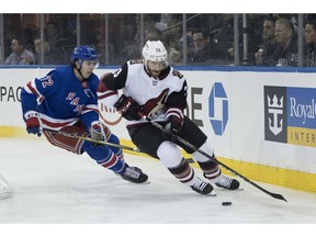 Arizona Coyotes defenseman Alex Goligoski (33) skates against New York Rangers center Filip Chytil (72) during the second period of an NHL hockey game, Friday, Dec. 14, 2018, at Madison Square Garden in New York.