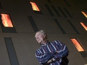 Famed Canadian artist and filmmaker Michael Snow standing in front of The Windows Suite, his public art installation, in Toronto, in 2006.