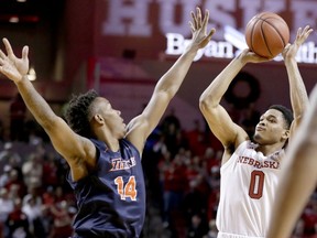 Nebraska's James Palmer Jr. (0) shoots over Cal State Fullerton's Khalil Ahmad (14) during the first half of an NCAA college basketball game in Lincoln, Neb., Saturday, Dec. 22, 2018.