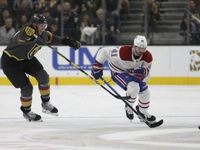 Montreal Canadiens left wing Paul Byron (41) goes for the puck during the first period of an NHL hockey game against the Vegas Golden Knights Saturday, Dec. 22, 2018, in Las Vegas.