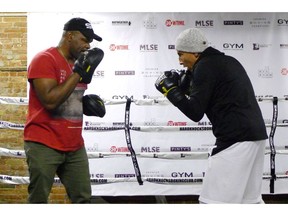 Samuel Vargas, right, works out with trainer Chris Johnson in Toronto ahead of Saturday's main event against unbeaten Argentine Adrian Gabriel Pereiro. Boxer Samuel Vargas first met Lee Baxter in his tattoo parlour. The meeting triggered a friendship -- and prompted Baxter to get into boxing promotion. Their latest collaboration, dubbed "Risky Business," is Saturday's card at the Coca-Cola Coliseum.