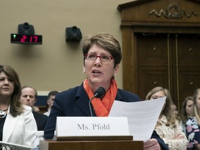 FILE - In this May 23, 2018, file photo, U.S. Center for SafeSport President and CEO Shellie Pfohl testifies before the House Commerce Oversight and Investigations Subcommittee about the Olympic community's ability to protect athletes from sexual abuse, on Capitol Hill in Washington. Pfohl is stepping down as CEO of the center after helping the organization gain footing over a two-year period of slow-but-steady progress.