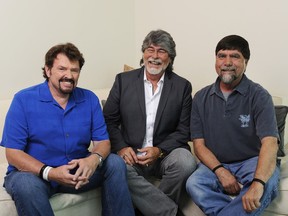 FILE - In this Aug. 13, 2013, file photo, Jeff Cook, from left, Randy Owen and Teddy Gentry from the American country music band Alabama pose for a portrait in Nashville, Tenn. Country band Alabama to mark 50 years together with a new tour in 2019, more than a year after founding member Cook announced that he has Parkinson's disease. Cook will join band members Owen and Gentry on the tour as much as physically possible on the tour that begins Jan. 10 in Detroit.