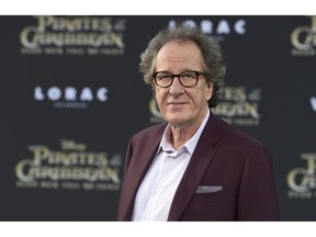 FILE - In this May 18, 2017, file photo, Geoffrey Rush arrives at the Los Angeles premiere of "Pirates of the Caribbean: Dead Men Tell No Tales" at the Dolby Theatre. "Orange Is the New Black" actress Yael Stone alleges actor Geoffrey Rush engaged in sexually inappropriate behavior when they starred in "The Diary of a Madman" in 2010.