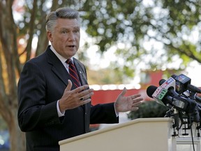 FILE - In this Nov. 7, 2018 file photo Republican Mark Harris speaks to the media during a news conference in Matthews, N.C. The North Carolina board investigating allegations of ballot fraud in a still-unresolved congressional race between Harris and Democrat Dan McCready could be disbanded Friday, Dec. 28 under a state court ruling in a protracted legal battle about how the panel operates. The state Elections Board has refused to certify the race between Harris and McCready while it investigates absentee ballot irregularities in the congressional district stretching from the Charlotte area through several counties to the east. Harris holds a slim lead in unofficial results, but election officials are looking into criminal allegations against an operative hired by the Harris campaign.