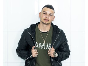 In this Nov. 7, 2018 photo, country singer Kane Brown poses for a portrait in New York. The singer from humble beginnings has become one of the brightest new singers in music and arguably country music's most successful act of the year.