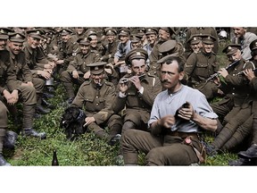 This image released by Warner Bros. Entertainment shows a scene from the WWI documentary "They Shall Not Grow Old," directed by Peter Jackson. Jackson drew on all the technical know-how of his big-budget spectacles to turn hundreds of hours of footage from the Western Front and audio of surviving soldiers into a seamless, unobstructed portrait of the war as seen from the British trenches. Jackson altered frame rates, colorized and turned 3-D the footage, even employing lip readers to capture dialogue.