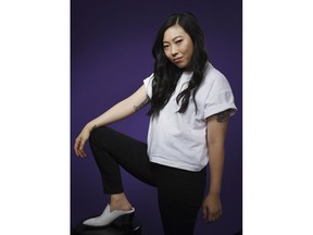 In this Dec. 5, 2018 photo, actress-rapper Awkwafina poses for a portrait in Los Angeles. Awkwafina, who appeared in the film, "Crazy Rich Asians," was named as one of eight Breakthrough Entertainers of the Year by the Associated Press.