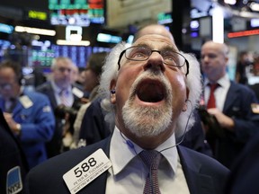 Trader Peter Tuchman works on the floor of the New York Stock Exchange, Friday, Dec. 28, 2018. Stocks are opening higher Friday as U.S. markets try to maintain the momentum from a late-day rally on Thursday.