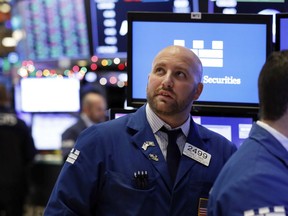 Specialist John Parisi watches the numbers near the close of trading on the floor of the New York Stock Exchange, Thursday, Dec. 27, 2018. U.S. stocks staged a furious late-afternoon rally Thursday, closing with gains after erasing a 600-point drop in the Dow Jones Industrial Average.