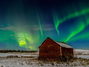 The northern lights illuminate the night sky west of Edmonton on Dec. 20, 2015.