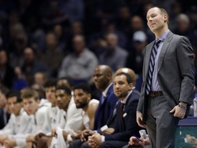 Xavier coach Travis Steele reacts during the team's NCAA college basketball game against Detroit Mercy in Cincinnati on Friday, Dec. 21, 2018.