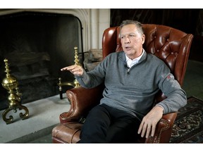 Ohio Gov. John Kasich sits for an interview with The Associated Press at the Ohio Governor's Residence and Heritage Garden, Thursday, Dec. 13, 2018, in Columbus. Kasich discussed his future upon departing office in January, including the possibility of a third presidential run.