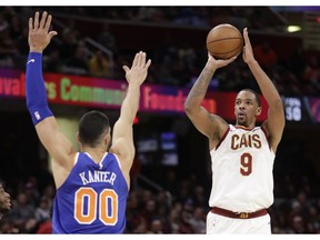 Cleveland Cavaliers' Channing Frye (9) shoots over New York Knicks' Enes Kanter (00), from Turkey, in the first half of an NBA basketball game, Wednesday, Dec. 12, 2018, in Cleveland.