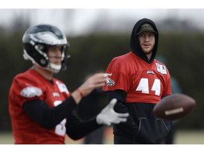 Philadelphia Eagles' Carson Wentz, right, watches as Nick Foles practices at the NFL football team's facility, Thursday, Dec. 13, 2018, in Philadelphia.
