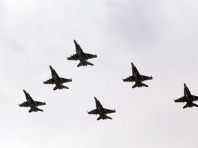Six CF-18 Hornet fighter jets takes off from 4 Wing Cold Lake on Tuesday, October 21, 2014.