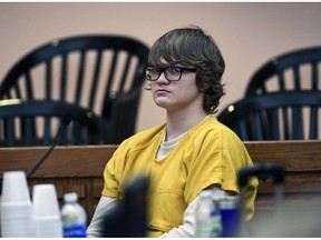FILE - In this Feb. 16, 2018 file photo Jesse Osborne waits for a ruling at the Anderson County Courthouse. Osborne, a teen charged with shooting at a group of South Carolina elementary school students outside for recess, killing one of them, is set to appear in court. Prosecutors would not say why Osborne will appear Wednesday, Dec. 12, 2018 at the Anderson County courthouse.