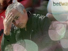 FILE - In this Saturday, Sept. 29, 2018 file photo Manchester United manager Jose Mourinho, seen through foam bubbles, wipes his forehead prior the English Premier League soccer match between West Ham United and Manchester United at London Stadium in London in London, England. Manchester United says Jose Mourinho has left the Premier League club with immediate effect. The decision was announced Tuesday Dec. 19, 2018, two days after a 3-1 loss to Liverpool left United 19 points off the top of the Premier League after 17 games.