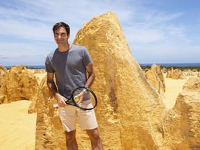 Swiss tennis player Roger Federer poses for a photograph during a media event at the Pinnacles in Nambung National Park, Western Australia Thursday, Dec. 27, 2018. Federer is scheduled to play in the Hopman Cup in Perth from this Saturday, Dec. 29.