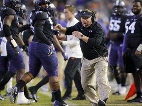 FILE - In this Nov. 24, 2018, file photo, TCU head coach Gary Patterson yells at one of his players during the second quarter of an NCAA college football game against Oklahoma State in Fort Worth, Texas. California, TCU looking to close out 2018 season on a high note at Cheez-It Bowl on Dec. 26, after struggling to gain bowl eligibility.