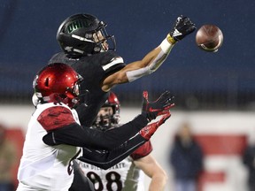 Ohio cornerback Marlin Brooks (22) breaks up a pass intended for San Diego State wide receiver Tim Wilson Jr. (6) in the first half of the Frisco Bowl NCAA college football game, Wednesday, Dec. 19, 2018, in Frisco, Texas.