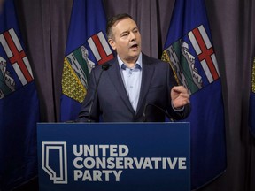 Jason Kenney speaks to the media at his first convention as leader of the United Conservative Party in Red Deer, Alta., Sunday, May 6, 2018.