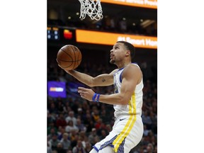 Golden State Warriors guard Stephen Curry (30) goes to the basket in the first half during an NBA basketball game against the Utah Jazz Wednesday Dec. 19, 2018, in Salt Lake City.