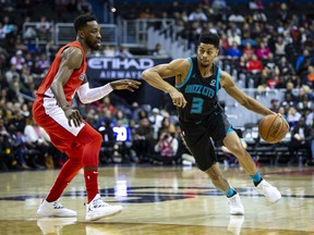 Charlotte Hornets guard Jeremy Lamb (3) drives against Washington Wizards forward Jeff Green during the first half of an NBA basketball game Saturday, Dec. 29, 2018, in Washington.