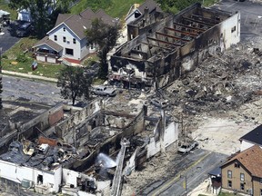 FILE - This July 11, 2018, file photo, shows the aftermath of a gas explosion in downtown Sun Prairie, Wis. Police in Sun Prairie are planning to announce Thursday, Dec. 20, the results of a criminal investigation into an explosion that leveled a city block and killed a firefighter.
