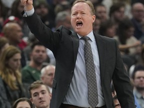 Milwaukee Bucks head coach Mike Budenholzer reacts during the first half of an NBA basketball game against the New Orleans Pelicans Wednesday, Dec. 19, 2018, in Milwaukee.
