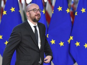 FILE - In this file photo dated Thursday, Dec. 13, 2018, Belgian Prime Minister Charles Michel arrives for an EU summit in Brussels.  Belgian Prime Minister Charles Michel has announced his resignation in address at parliament, Tuesday, Dec. 18, 2018, and says he will notify the king.