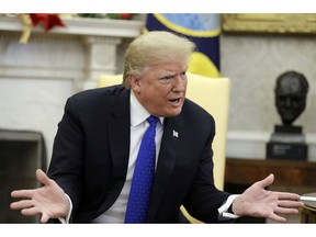 In this Dec. 11, 2018, photo, President Donald Trump meets with Senate Minority Leader Chuck Schumer, D-N.Y., and House Minority Leader Nancy Pelosi, D-Calif., in the Oval Office of the White House in Washington.