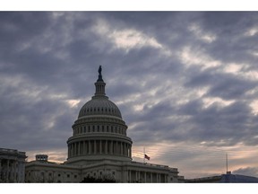 The Capitol is seen in Washington, Friday morning, Dec. 14, 2018, after Congress adjourned until next week. Congress is racing to avoid a partial government shutdown over President Donald Trump's border. But you wouldn't know it by the schedule. Lawmakers are away until next week. The ball is in Trump's court, both sides say.