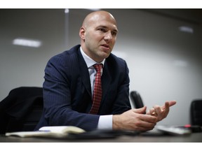 In this Nov. 29, 2018 photo, Rep.-elect Anthony Gonzalez, R-Ohio speaks during an interview with the Associated Press at the National Republican Congressional Committee offices in Washington. This year's midterm election is sending a record 43 Latinos to Congress.