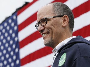 FILE - In this Nov. 4, 2018, file photo, Tom Perez, Chairman of the Democratic National Committee, waits to speak during an early voting campaign event in Cincinnati. Democratic National Committee officials and a group of state party leaders are set Tuesday to hash out an increasingly ugly fight over how the party manages and pays for the voter data used in campaigns.