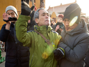 Plainclothes security take away a supporter of Chinese human rights lawyer Wang Quanzhang near the People’s Court of Tianjin on Dec. 26, 2018. The trial of Wang, charged with subversion of state power in 2016, is derailed after he fired his state-appointed lawyer.