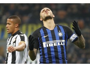 Inter Milan's Mauro Icardi reacts during an Italian Serie A soccer match between Inter Milan and Udinese, at the San Siro stadium in Milan, Italy, Saturday, Dec. 15, 2018.