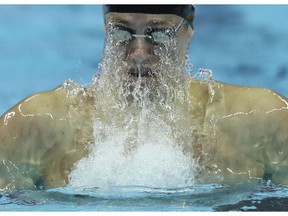 Russia's Kirill Prigoda competes as he breaks the world record during the men's 200m breaststroke at the 14th FINA World Swimming Championships in Hangzhou in eastern China's Zhejiang Province on Thursday, Dec. 13, 2018. Prigoda won gold and broke the record with a time of 2:00.16