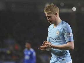 Manchester City's Kevin De Bruyne waits to take a corner kick during the English League Cup quarterfinal soccer match at the King Power stadium in Leicester, England, Tuesday, Dec.18, 2018.