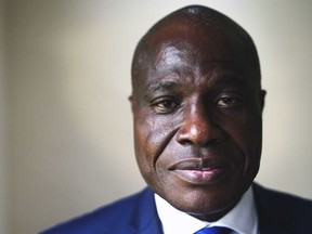 Congolese opposition presidential candidate Martin Fayulu poses for a portrait following an interview with the Associated Press in Kinshasa, Congo, Thursday Dec. 27, 2018. Police in eastern Congo fired live ammunition and tear gas on Thursday to disperse more than 100 people protesting a presidential election delay, blamed on a deadly Ebola outbreak, that means more than 1 million votes will not count. Some protesters attacked an Ebola treatment center, with a number of patients fleeing.