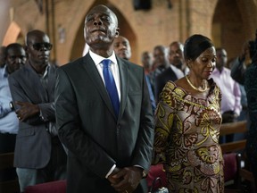 Congolese opposition presidential candidate Martin Fayulu attends a prayer service at Notre Dame du Congo cathedral in Kinshasa, Congo, Saturday Dec. 29, 2018.