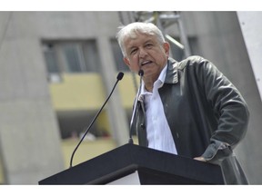 FILE - In this Sept. 29, 2018 file photo, Mexico's President Andres Manuel Lopez Obrador speaks at a rally at the Tlatelolco Plaza in Mexico City. Lopez Obrador signed on Wednesday, Dec. 12, 2018, an initiative that would cancel the controversial education reforms of his predecessor. It was one of Lopez Obrador's most oft-repeated campaign promises and a gift to teachers' unions.