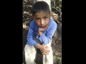 This Dec, 12, 2018 photo provided by Catarina Gomez on Thursday, Dec. 27, 2018, shows her half-brother Felipe Gomez Alonzo, 8, near her home in Yalambojoch, Guatemala. The 8-year-old boy died in U.S. custody at a New Mexico hospital on Christmas Eve after suffering a cough, vomiting and fever, authorities said. The cause is under investigation.