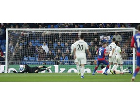 CSKA forward Fedor Chalov, right, scores the opening goal during the Champions League, Group G soccer match between Real Madrid and CSKA Moscow, at the Santiago Bernabeu stadium, Wednesday Dec. 12, 2018.